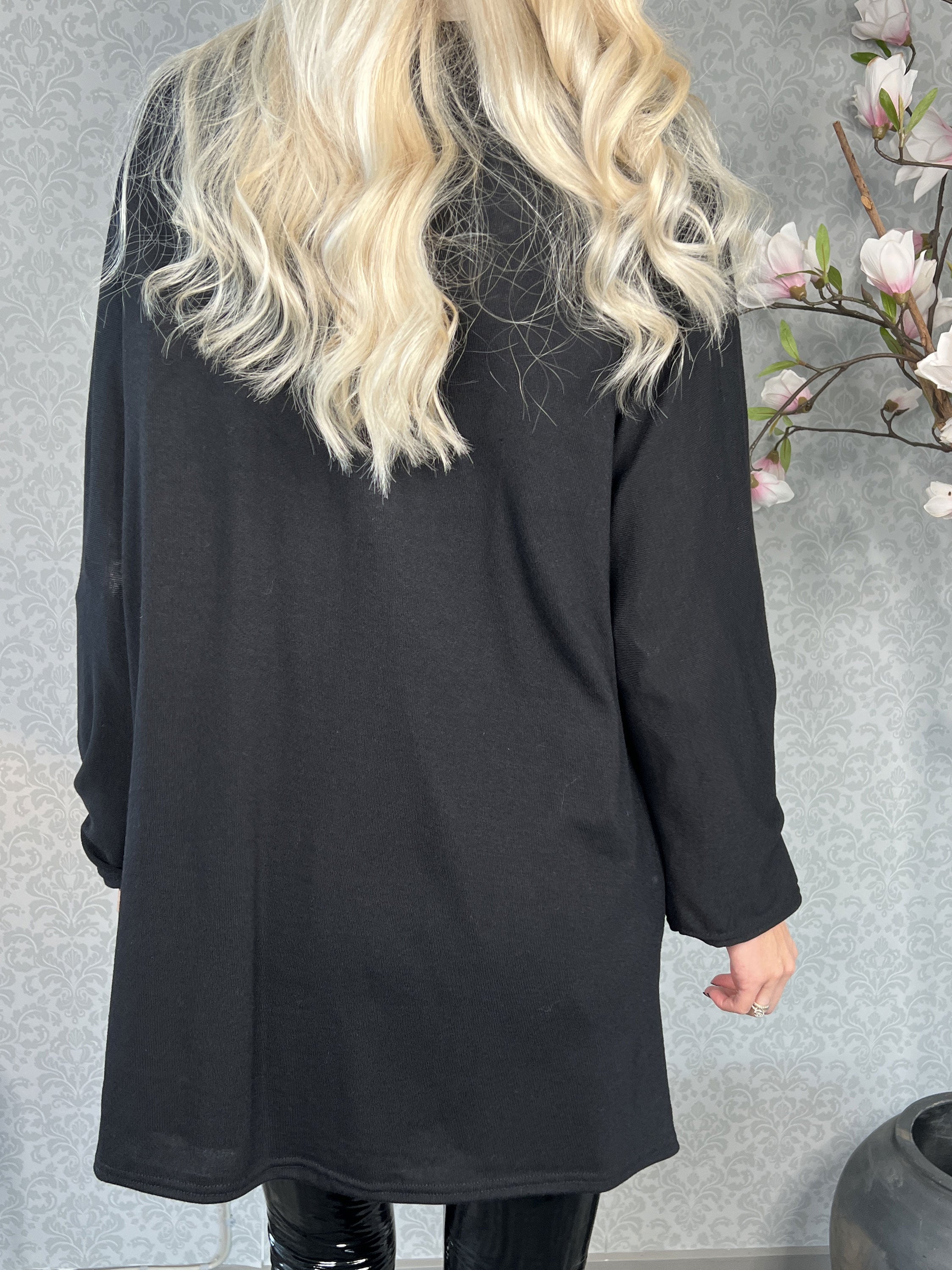 Nerea - Lätt stickad med skrivande framsida